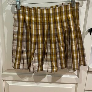 Plaid mini skirt. Medium but fits more like a small